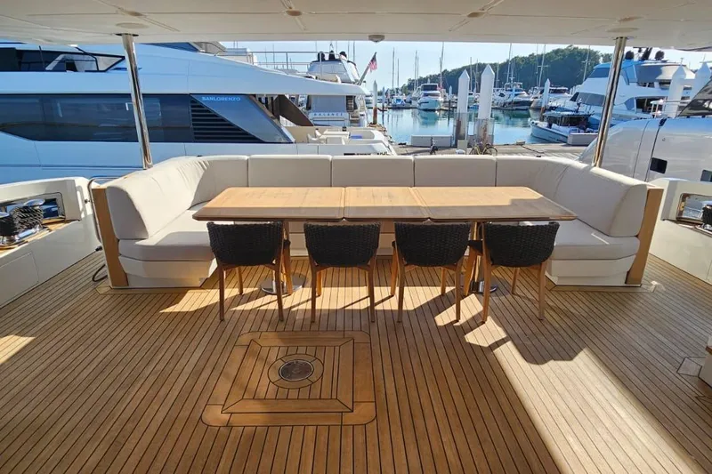  Yacht Photos Pics Luxurious Azimut Grande 32 Metri yacht deck with elegant seating and dining area, 2022 model.