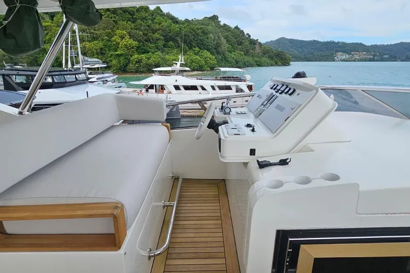  Yacht Photos Pics Luxurious Azimut Grande 32 Metri yacht helm, 2022 model, docked with scenic ocean view.