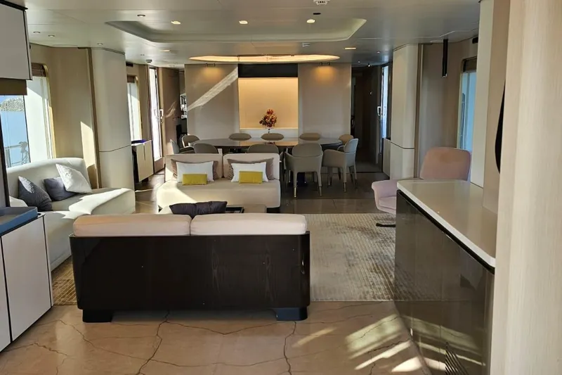  Yacht Photos Pics Luxurious interior of 2022 Azimut Grande 32 Metri yacht, featuring elegant seating and dining area.