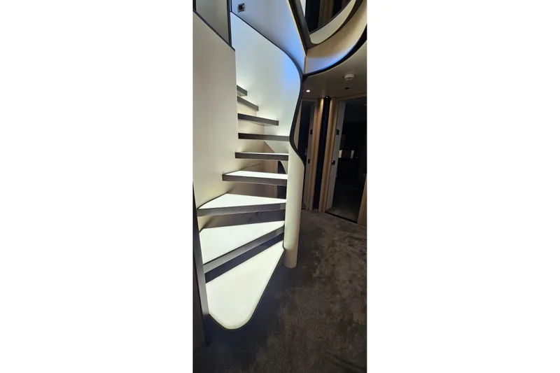  Yacht Photos Pics Modern staircase with ambient lighting on Azimut Grande 32 Metri yacht, 2022 model.