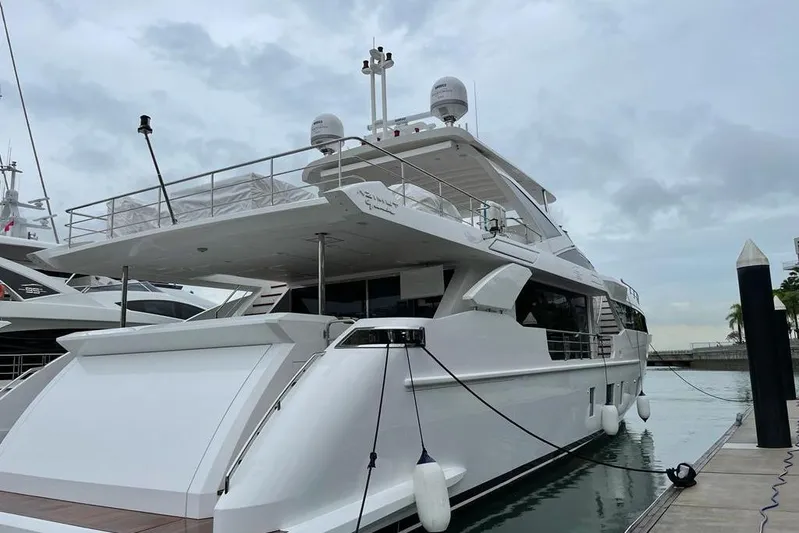  Yacht Photos Pics Luxury Azimut Grande 32 Metri yacht docked, 2022 model, sleek design, overcast sky.