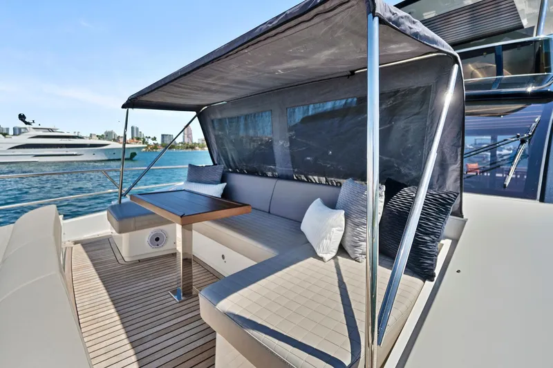 Smile Yacht Photos Pics Astondoa 66 Flybridge 2023 yacht with shaded seating area and elegant design.