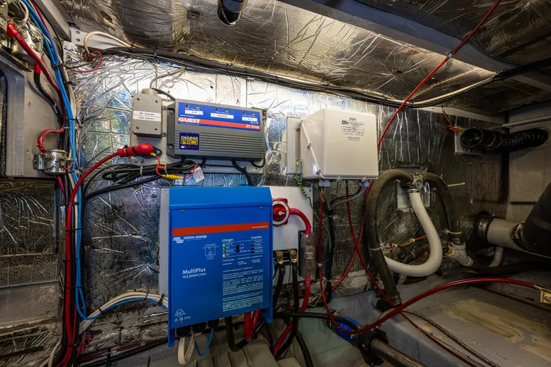 Holiday Yacht Photos Pics Engine room of 1991 Tollycraft 48 Cockpit Motor Yacht with electrical systems and wiring.