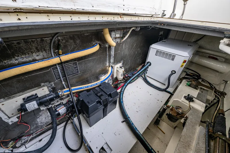 Holiday Yacht Photos Pics Engine room of 1991 Tollycraft 48 Cockpit Motor Yacht with wiring and equipment.