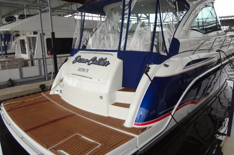 Dream Catcher Yacht Photos Pics 2010 Formula 45 Yacht docked, featuring sleek design and wooden deck in Austin, TX marina.