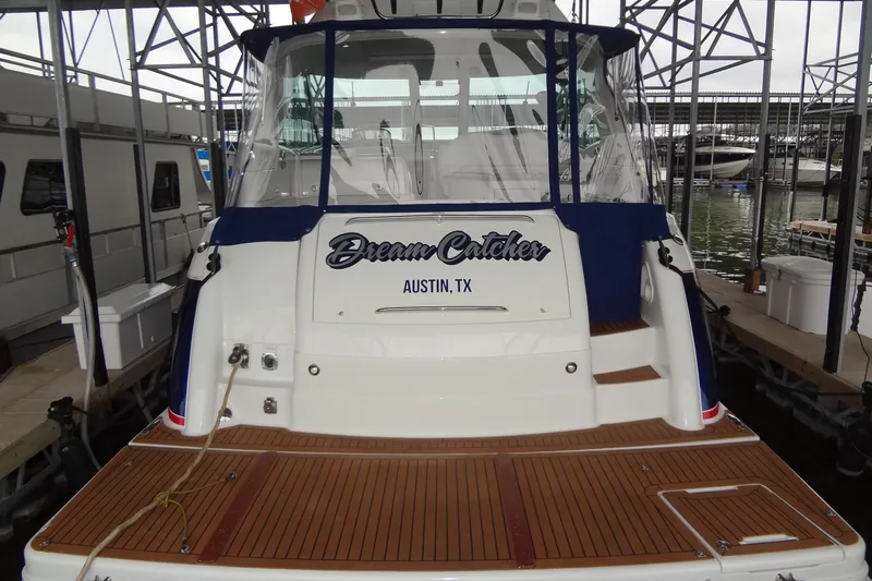 Dream Catcher Yacht Photos Pics 2010 Formula 45 Yacht docked, rear view with "Dream Catcher" name, Austin, TX.