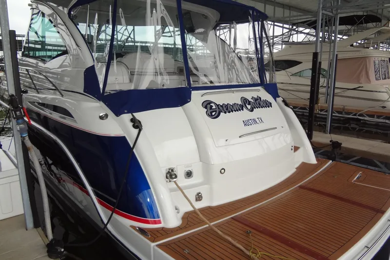 Dream Catcher Yacht Photos Pics 2010 Formula 45 Yacht docked, featuring sleek design and wooden deck.