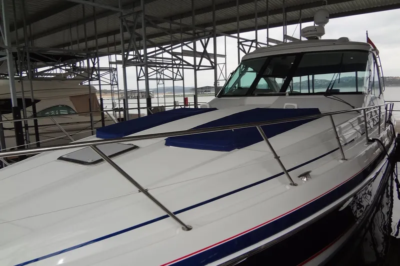 Dream Catcher Yacht Photos Pics 2010 Formula 45 Yacht docked under a covered marina.