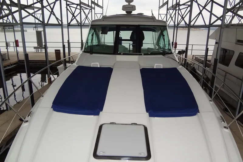 Dream Catcher Yacht Photos Pics 2010 Formula 45 Yacht docked, featuring blue sun pads and sleek design.