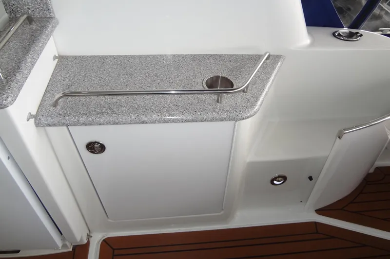 Dream Catcher Yacht Photos Pics Interior of 2010 Formula 45 Yacht with granite countertop and stainless steel railing.