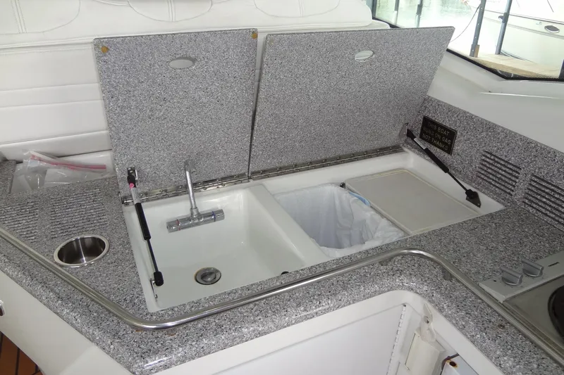 Dream Catcher Yacht Photos Pics 2010 Formula 45 Yacht kitchenette with granite countertop and sink.