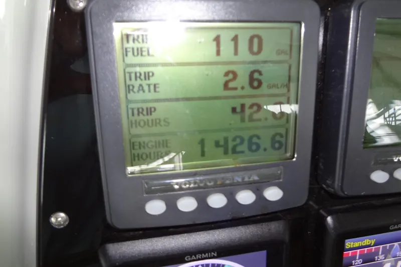 Dream Catcher Yacht Photos Pics Display screen on 2010 Formula 45 Yacht showing fuel and engine data.