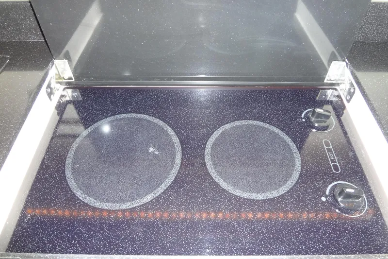 Dream Catcher Yacht Photos Pics Built-in electric stove on 2010 Formula 45 Yacht kitchen.