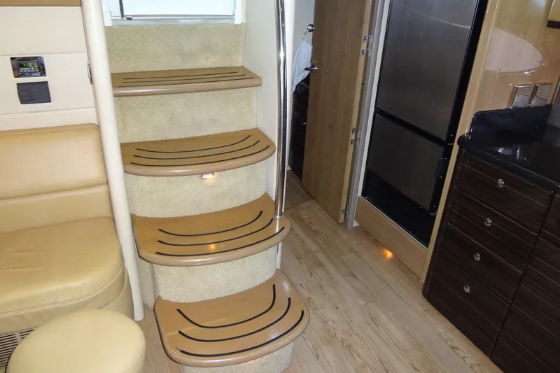Dream Catcher Yacht Photos Pics Interior of 2010 Formula 45 Yacht featuring stairs, seating, and cabinetry.