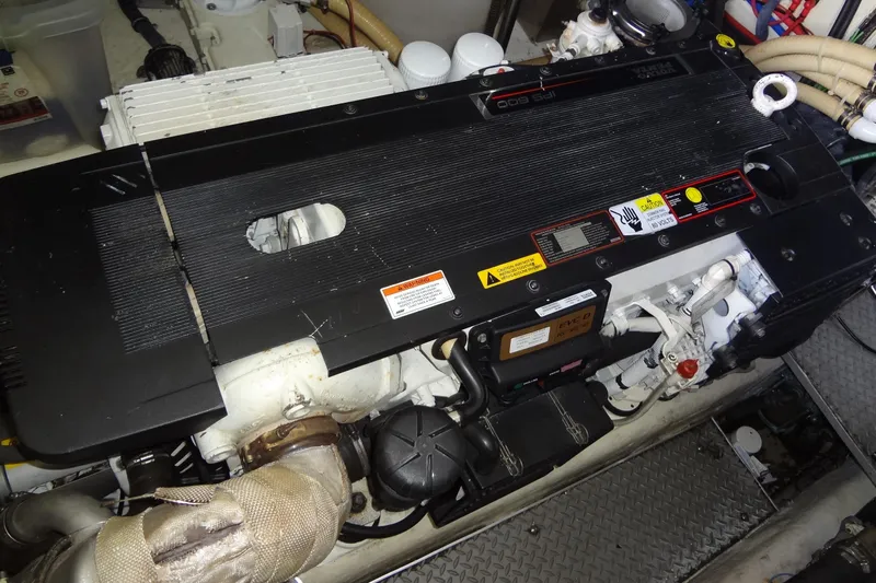 Dream Catcher Yacht Photos Pics Engine compartment of a 2010 Formula 45 Yacht, featuring detailed mechanical components.