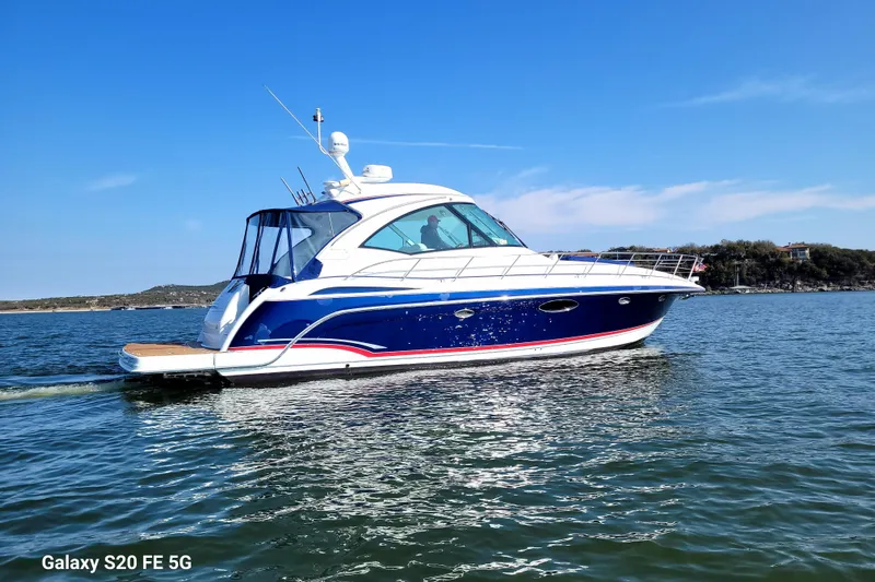 Dream Catcher Yacht Photos Pics 2010 Formula 45 Yacht cruising on a sunny day, blue and white design.