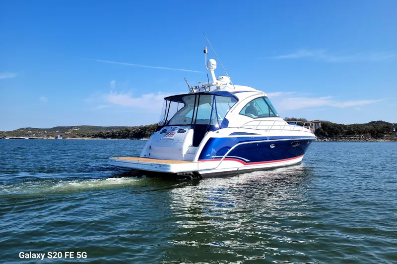 Dream Catcher Yacht Photos Pics 2010 Formula 45 Yacht cruising on a sunny day, blue and white design.