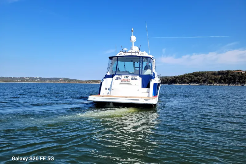 Dream Catcher Yacht Photos Pics 2010 Formula 45 Yacht cruising on a sunny lake with clear blue skies.