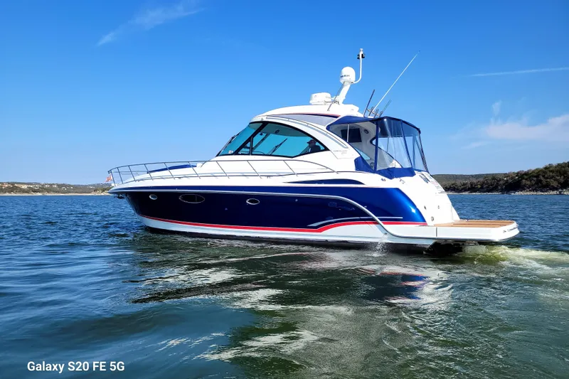 Dream Catcher Yacht Photos Pics 2010 Formula 45 Yacht cruising on a sunny day, blue and white design.