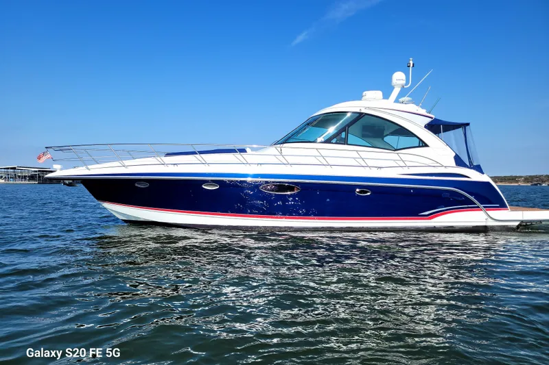 Dream Catcher Yacht Photos Pics 2010 Formula 45 Yacht on water, sleek design, blue and white exterior.