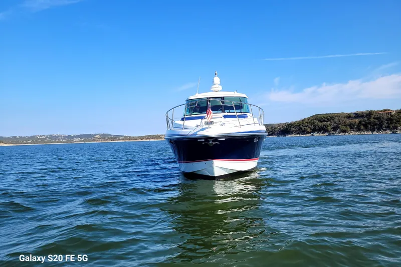 Dream Catcher Yacht Photos Pics 2010 Formula 45 Yacht on serene blue waters under clear sky.