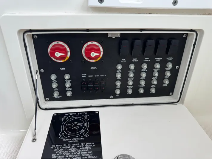  Yacht Photos Pics Control panel of a 2019 Boston Whaler 315 Conquest boat with switches and dials.