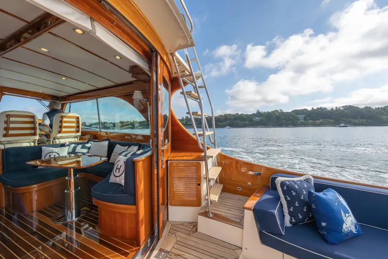 Virginia Yacht Photos Pics 2013 Hinckley Talaria 48 Flybridge interior with elegant wood finish and scenic water view.