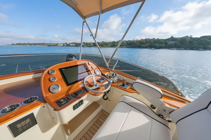 Virginia Yacht Photos Pics Helm of 2013 Hinckley Talaria 48 Flybridge yacht with scenic water view.