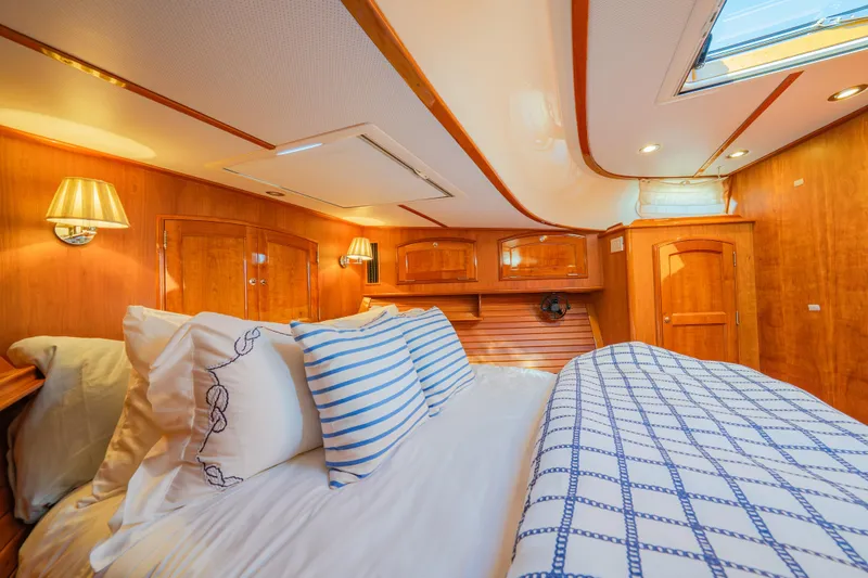 Virginia Yacht Photos Pics Luxurious cabin interior of 2013 Hinckley Talaria 48 Flybridge with elegant wood finish.