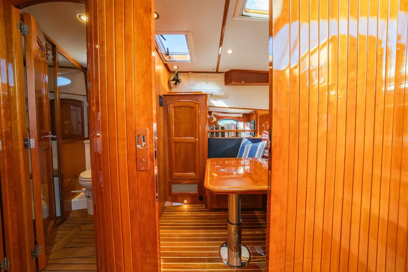 Virginia Yacht Photos Pics Luxurious 2013 Hinckley Talaria 48 Flybridge interior with polished wood and elegant furnishings.