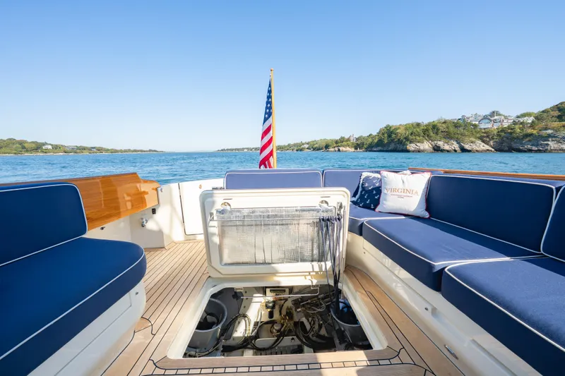 Virginia Yacht Photos Pics Hinckley Talaria 48 Flybridge 2013 yacht deck with blue seating and open engine hatch.