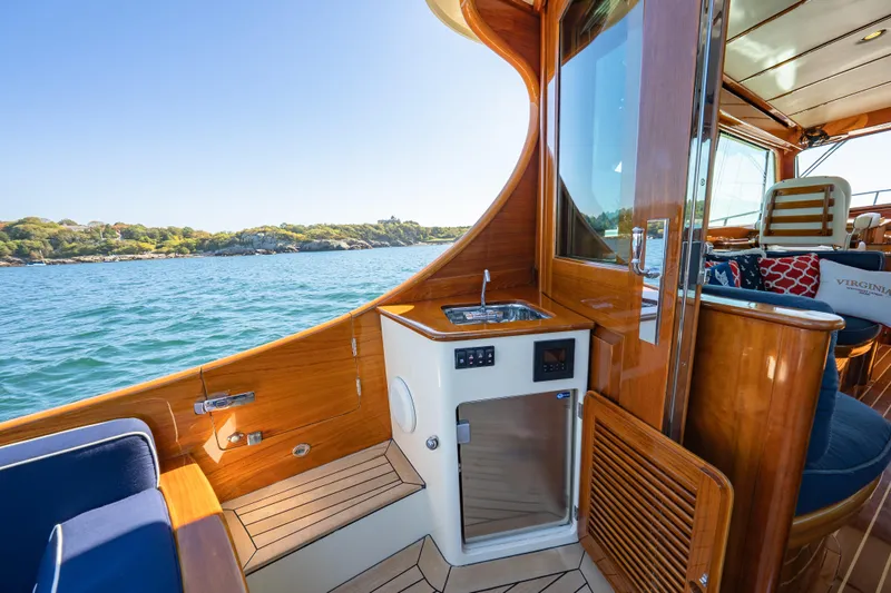 Virginia Yacht Photos Pics Luxurious 2013 Hinckley Talaria 48 Flybridge yacht interior with wooden finish and ocean view.