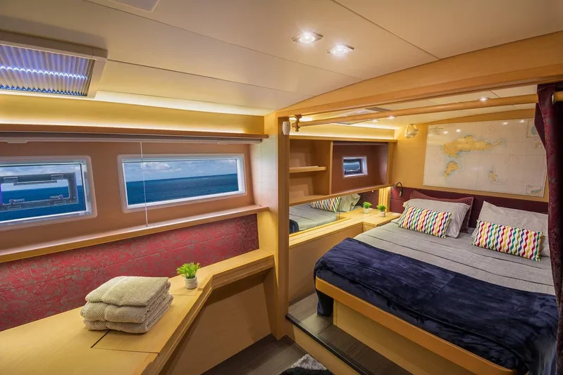 Sami Malu Yacht Photos Pics Luxurious cabin interior of 2017 Lagoon 52 F yacht with ocean view windows.