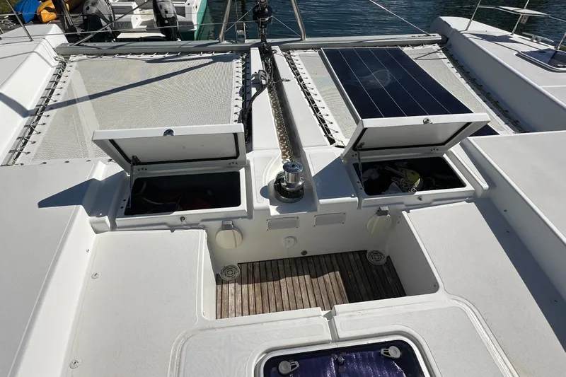 Sami Malu Yacht Photos Pics 2017 Lagoon 52 F catamaran deck with open storage compartments and solar panel.