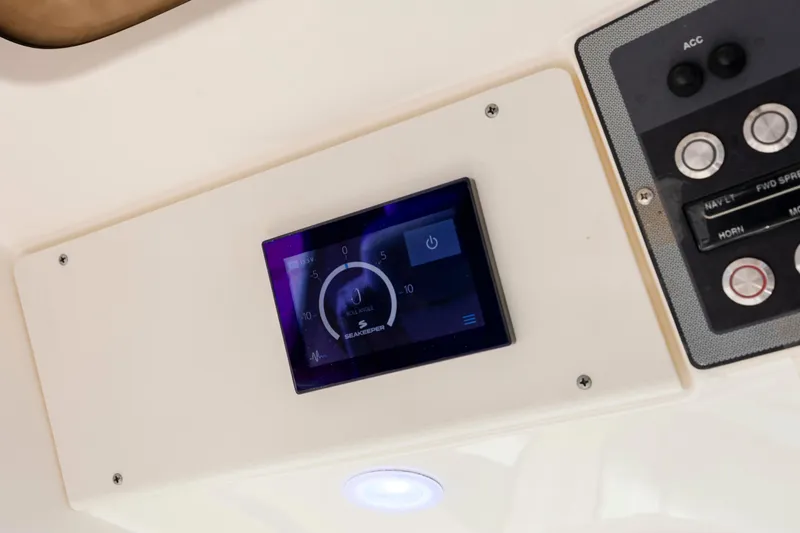  Yacht Photos Pics Control panel of 2019 Scout 355 LXF boat featuring Seakeeper display.