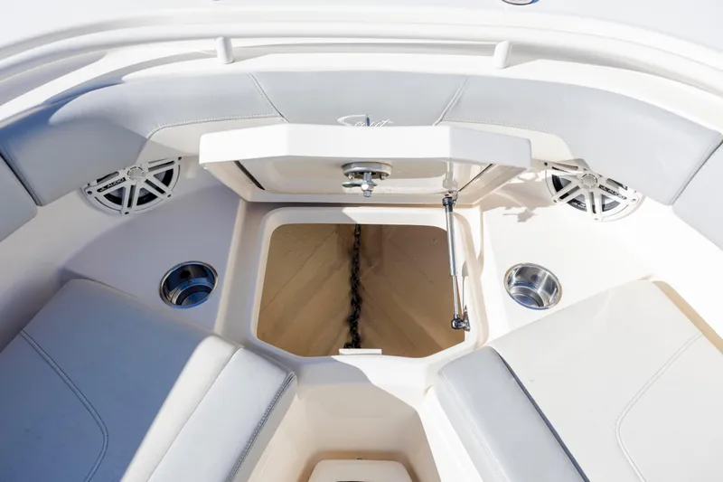  Yacht Photos Pics 2019 Scout 355 LXF boat interior with anchor storage and seating area.
