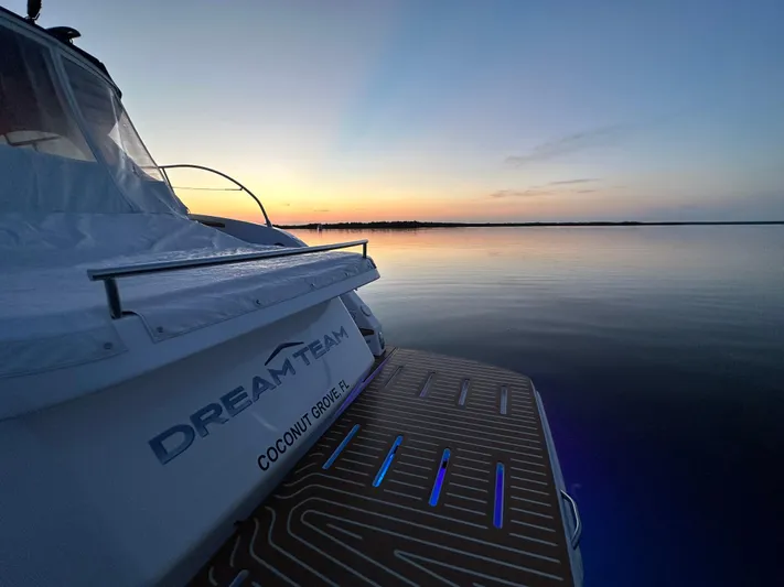  Yacht Photos Pics Azimut Atlantis 45 yacht at sunset, serene waters, 2021 model.