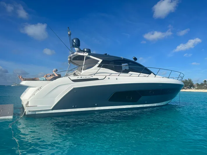  Yacht Photos Pics 2021 Azimut Atlantis 45 yacht on clear blue water under a sunny sky.