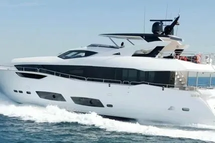  Yacht Photos Pics 2018 Sunseeker 95 Yacht cruising on open water, showcasing sleek design and luxury features.
