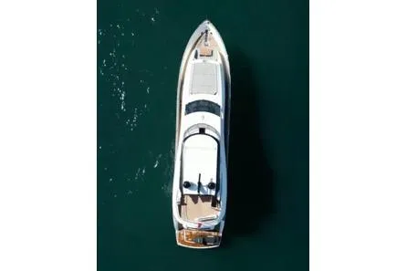  Yacht Photos Pics Overhead view of 2018 Sunseeker 95 Yacht on calm water.