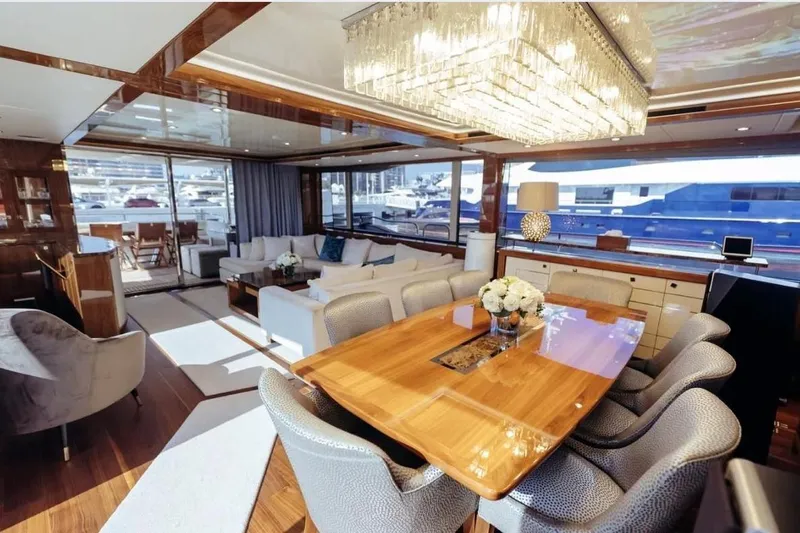  Yacht Photos Pics Luxurious interior of 2018 Sunseeker 95 Yacht with elegant dining area and modern decor.