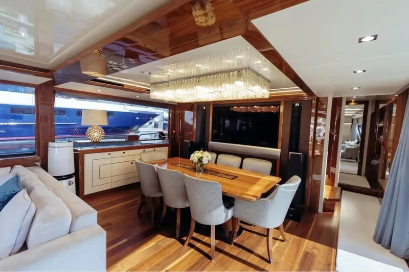  Yacht Photos Pics Luxurious interior of 2018 Sunseeker 95 Yacht with elegant dining area and modern decor.