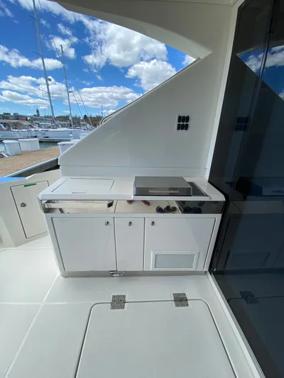 Inconseavable Yacht Photos Pics Galley area on a 2014 Marquis 500 Sport Bridge yacht.