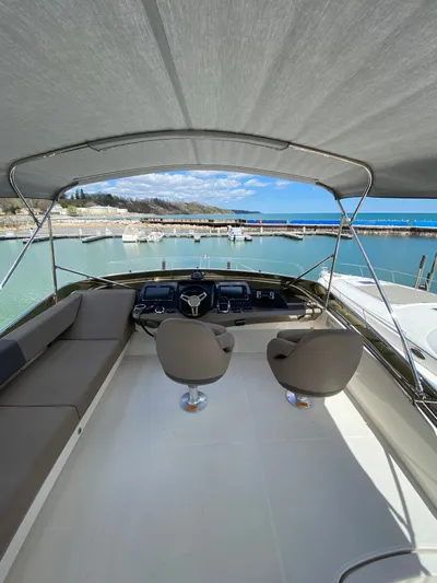 Inconseavable Yacht Photos Pics 2014 Marquis 500 Sport Bridge helm with ocean view.