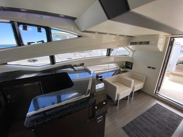 Inconseavable Yacht Photos Pics Interior of 2014 Marquis 500 Sport Bridge yacht.