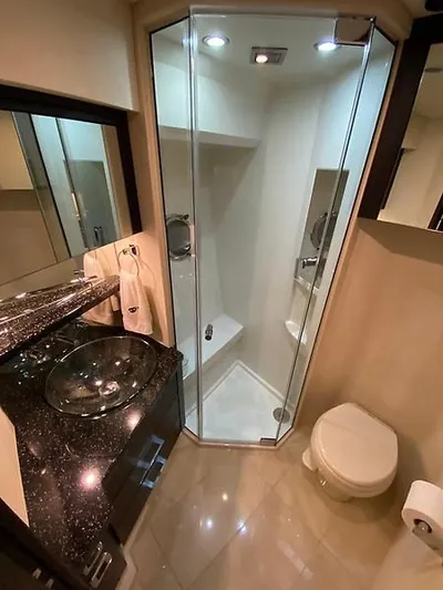 Inconseavable Yacht Photos Pics Luxurious bathroom in a 2014 Marquis 500 Sport Bridge yacht.