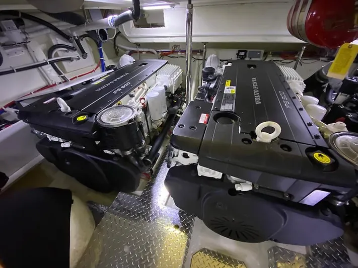 Inconseavable Yacht Photos Pics Engine room of 2014 Marquis 500 Sport Bridge with Volvo Penta engines.