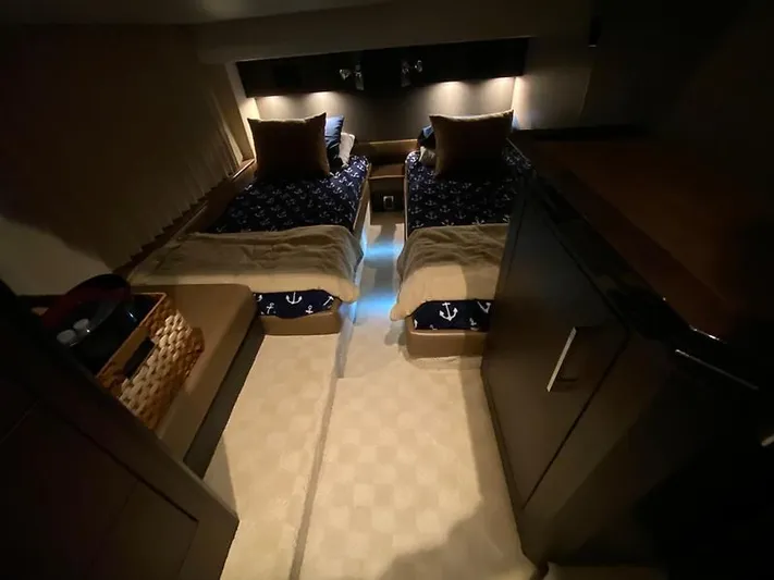 Inconseavable Yacht Photos Pics Interior of 2014 Marquis 500 Sport Bridge with twin beds.