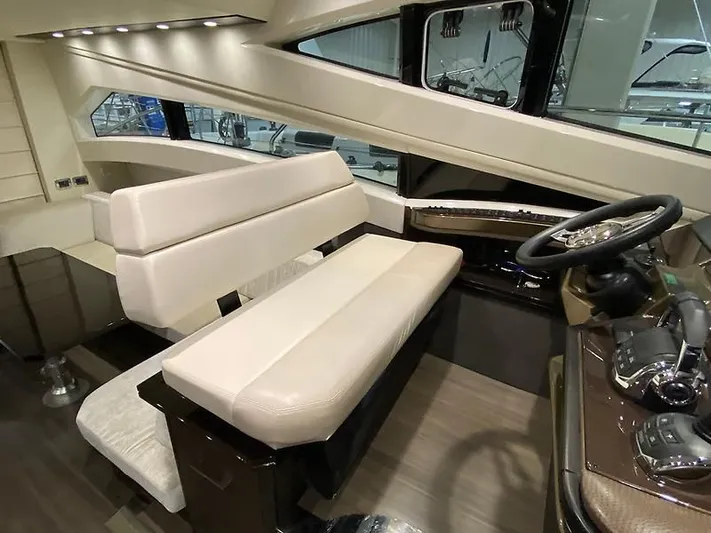 Inconseavable Yacht Photos Pics Interior of 2014 Marquis 500 Sport Bridge yacht.
