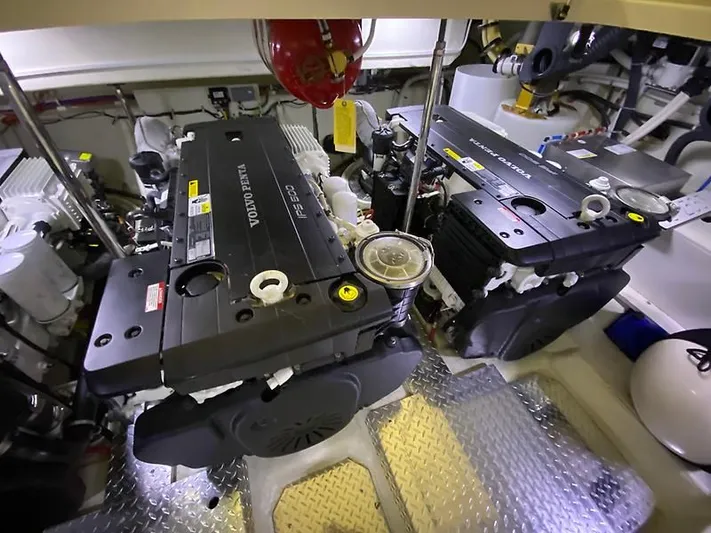 Inconseavable Yacht Photos Pics Engine room of 2014 Marquis 500 Sport Bridge with Volvo Penta IPS 600.